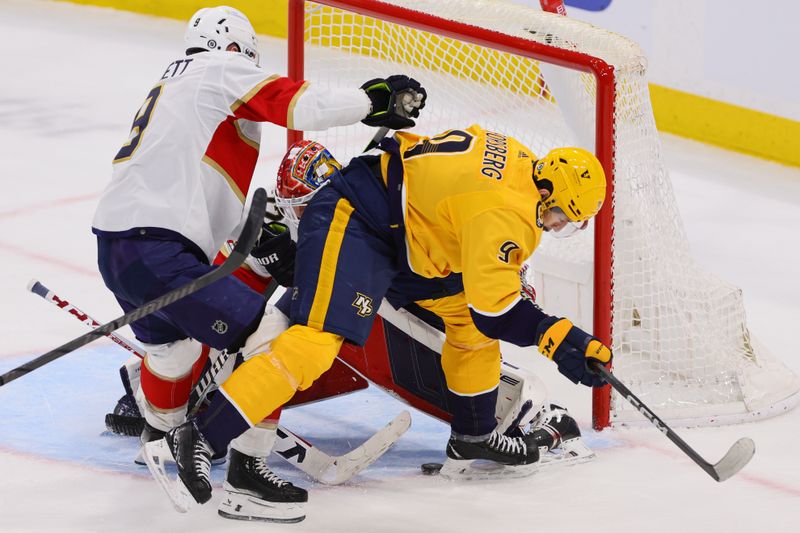 Mar 21, 2024; Sunrise, Florida, USA; Nashville Predators left wing Filip Forsberg (9) scores against Florida Panthers goaltender Sergei Bobrovsky (72) during the third period at Amerant Bank Arena. Mandatory Credit: Sam Navarro-USA TODAY Sports