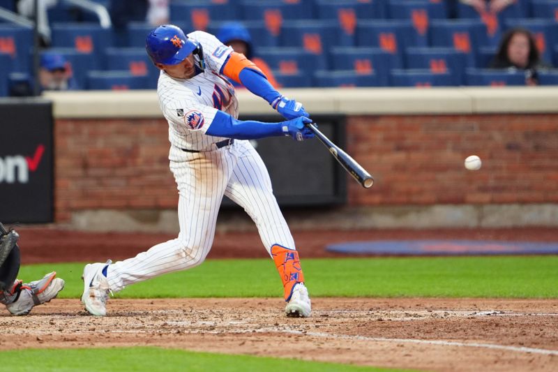 Apr 4, 2024; New York City, New York, USA; New York Mets left fielder Tyrone Taylor (15) hits an RBI single against the Detroit Tigers during the ninth inning at Citi Field. Mandatory Credit: Gregory Fisher-USA TODAY Sports