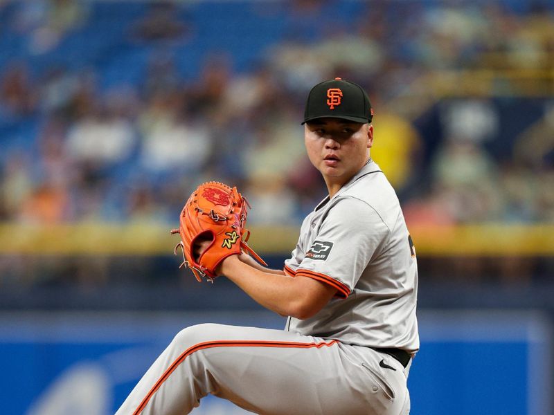 Apr 14, 2024; St. Petersburg, Florida, USA;  San Francisco Giants pitcher Kai-Wei Teng (70) throws a pitch against the Tampa Bay Rays in the seventh inning at Tropicana Field. Mandatory Credit: Nathan Ray Seebeck-USA TODAY Sports