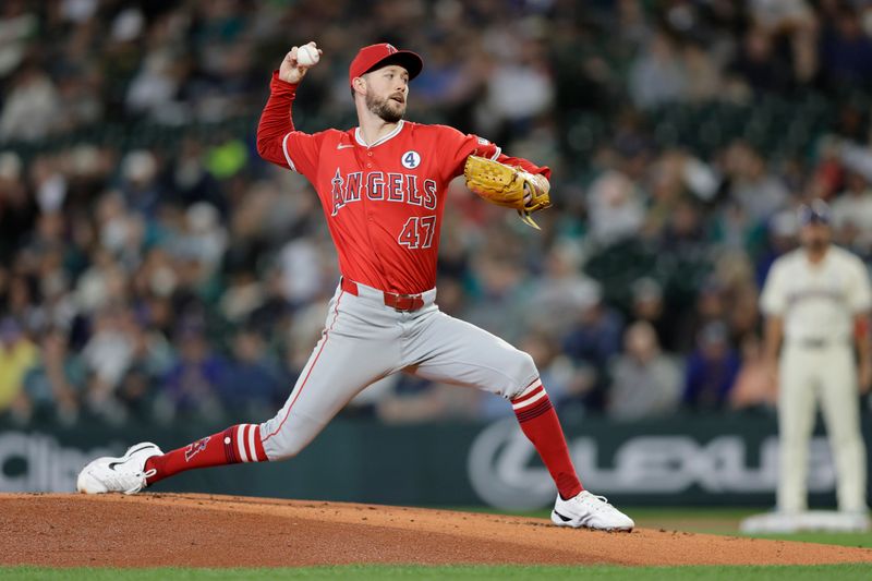 Jun 2, 2024; Seattle, Washington, USA; Los Angeles Angels starting pitcher Griffin Canning (47) throws against the Seattle Mariners during the first inning at T-Mobile Park. Mandatory Credit: John Froschauer-USA TODAY Sports