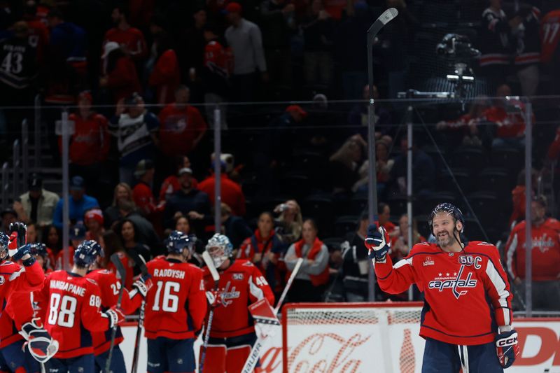 Oct 29, 2024; Washington, District of Columbia, USA; Washington Capitals left wing Alex Ovechkin (8) waves to family in the stands after their game against the New York Rangers at Capital One Arena. Mandatory Credit: Geoff Burke-Imagn Images