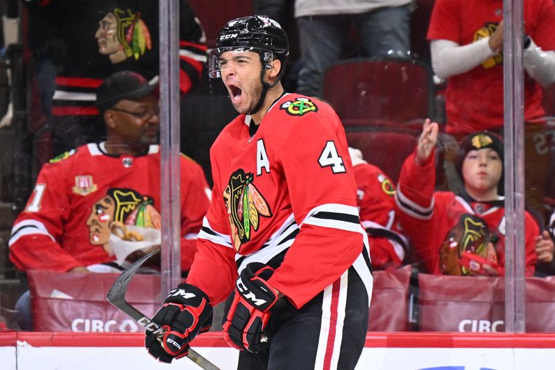 Mar 6, 2023; Chicago, Illinois, USA;  Chicago Blackhawks defenseman Seth Jones (4) celebrates after scoring a goal in the second period against the Ottawa Senators at United Center. Mandatory Credit: Jamie Sabau-USA TODAY Sports