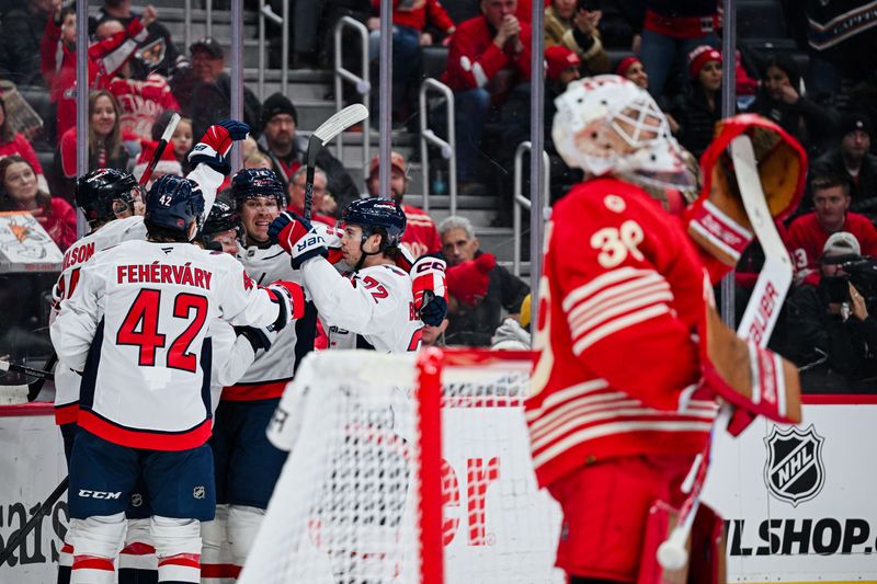Dec 21, 2025; Detroit, Michigan, USA; Washington Capitals center Ethen Frank (53) celebrates his goal with teammates during the third period against the Detroit Red Wings at Little Caesars Arena. Mandatory Credit: Tim Fuller-Imagn Images