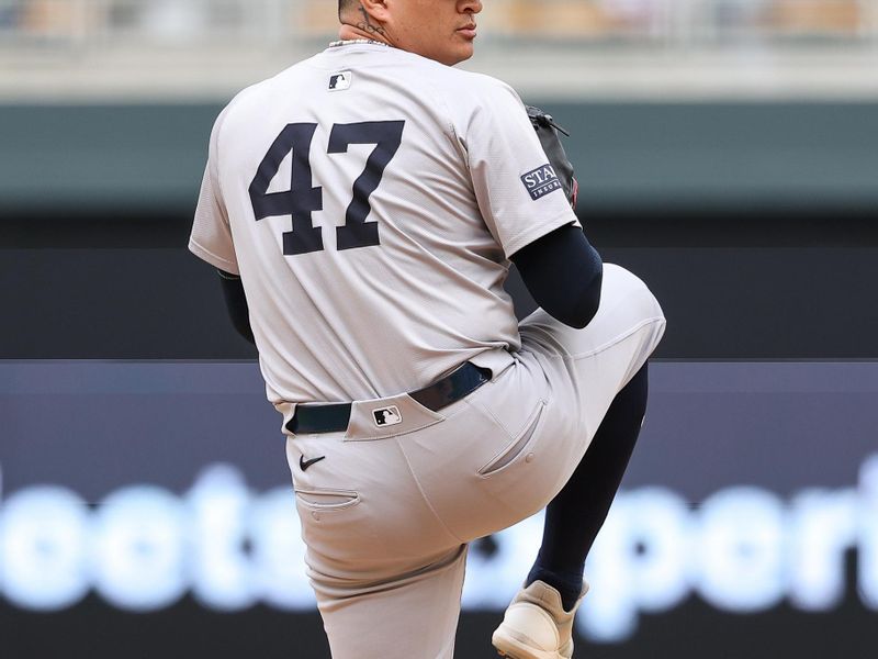 May 16, 2024; Minneapolis, Minnesota, USA; New York Yankees relief pitcher Victor Gonzalez (47) delivers a pitch against the Minnesota Twins during the ninth inning at Target Field. Mandatory Credit: Matt Krohn-USA TODAY Sports