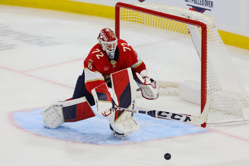 Oct 8, 2024; Sunrise, Florida, USA; Florida Panthers goaltender Sergei Bobrovsky (72) deflects a shot during the third period against the Boston Bruins at Amerant Bank Arena. Mandatory Credit: Sam Navarro-Imagn Images