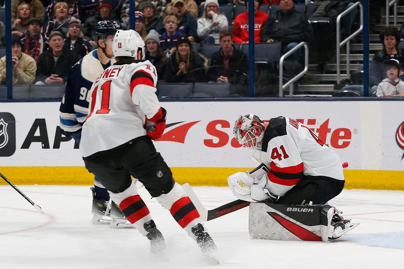 Jan 19, 2024; Columbus, Ohio, USA; New Jersey Devils goalie Vitek Vanecek (41) makes a save against the Columbus Blue Jackets during the first period at Nationwide Arena. Mandatory Credit: Russell LaBounty-USA TODAY Sports