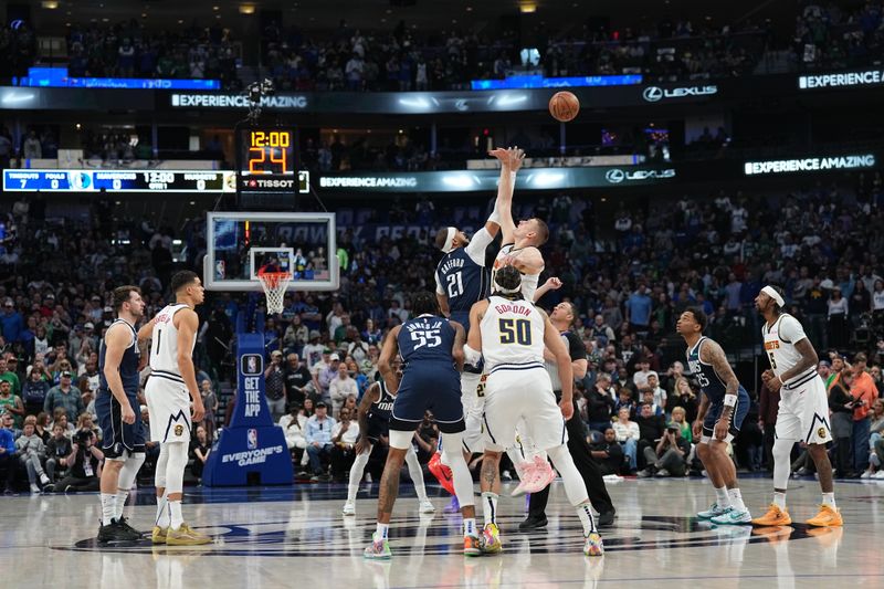 DALLAS, TX - MARCH 17: The Denver Nuggets goes for the tipoff against the Dallas Mavericks on March 17, 2024 at the American Airlines Center in Dallas, Texas. NOTE TO USER: User expressly acknowledges and agrees that, by downloading and or using this photograph, User is consenting to the terms and conditions of the Getty Images License Agreement. Mandatory Copyright Notice: Copyright 2024 NBAE (Photo by Glenn James/NBAE via Getty Images)