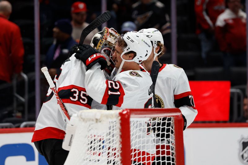 Oct 25, 2025; Washington, District of Columbia, USA; Ottawa Senators goaltender Linus Ullmark (35) celebrates with Senators center Nick Cousins (21) after their game against the Washington Capitals at Capital One Arena. Mandatory Credit: Geoff Burke-Imagn Images