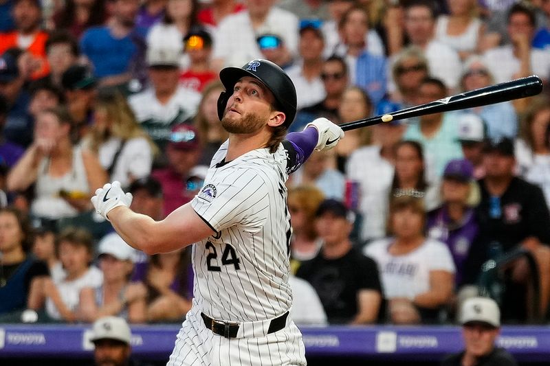 Jul 4, 2024; Denver, Colorado, USA; Colorado Rockies third baseman Ryan McMahon (24) reacts against the Milwaukee Brewers during the seventh inning at Coors Field. Mandatory Credit: Troy Babbitt-USA TODAY Sports

 