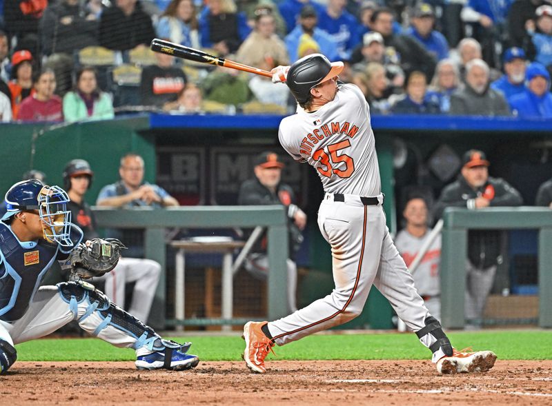 Apr 19, 2024; Kansas City, Missouri, USA; Baltimore Orioles catcher Adley Rutschman (35) hits a grand slam in the seventh inning at against the Kansas City Royals Kauffman Stadium. Mandatory Credit: Peter Aiken-USA TODAY Sports