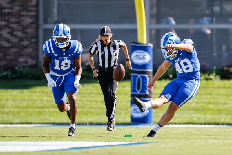 Sep 16, 2023; Durham, North Carolina, USA; Duke Blue Devils place kicker Ryan Degyansky (48) kicks the ball during the first half against Northwestern Wildcats at Wallace Wade Stadium. Mandatory Credit: Jaylynn Nash-USA TODAY Sports