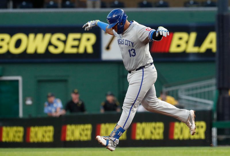 Sep 13, 2024; Pittsburgh, Pennsylvania, USA;  Kansas City Royals catcher Salvador Perez (13) gestures as he circles the bases on a two run home run against the Pittsburgh Pirates during the second inning at PNC Park. Mandatory Credit: Charles LeClaire-Imagn Images