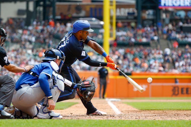 May 26, 2024; Detroit, Michigan, USA; Detroit Tigers second baseman Andy Ibáñez (77) hits during an at bat in the fourth inning of the game at Comerica Park. Mandatory Credit: Brian Bradshaw Sevald-USA TODAY Sports