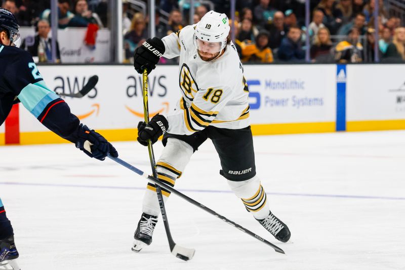 Feb 26, 2024; Seattle, Washington, USA; Boston Bruins center Pavel Zacha (18) shoots the puck against the Seattle Kraken during the second period at Climate Pledge Arena. Mandatory Credit: Joe Nicholson-USA TODAY Sports