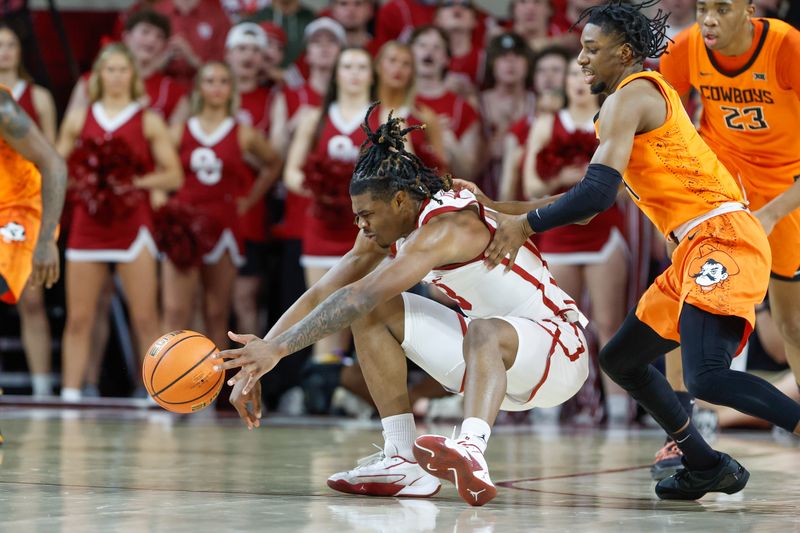 Feb 10, 2024; Norman, Oklahoma, USA; Oklahoma Sooners guard Otega Oweh (3) reaches for a loose ball in front of during the first half at Lloyd Noble Center. Mandatory Credit: Alonzo Adams-USA TODAY Sports