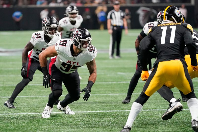 Atlanta Falcons defensive end Joe Gaziano (99) rushes off the line in the first half of an NFL football game against the Pittsburgh Steelers in Atlanta, Thursday, Aug. 24, 2023. (AP Photo/Gerald Herbert)