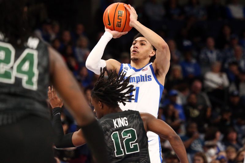 Feb 11, 2024; Memphis, Tennessee, USA; Memphis Tigers guard Jahvon Quinerly (11) shoots the ball during the first half against the Tulane Green Wave at FedExForum. Mandatory Credit: Petre Thomas-USA TODAY Sports