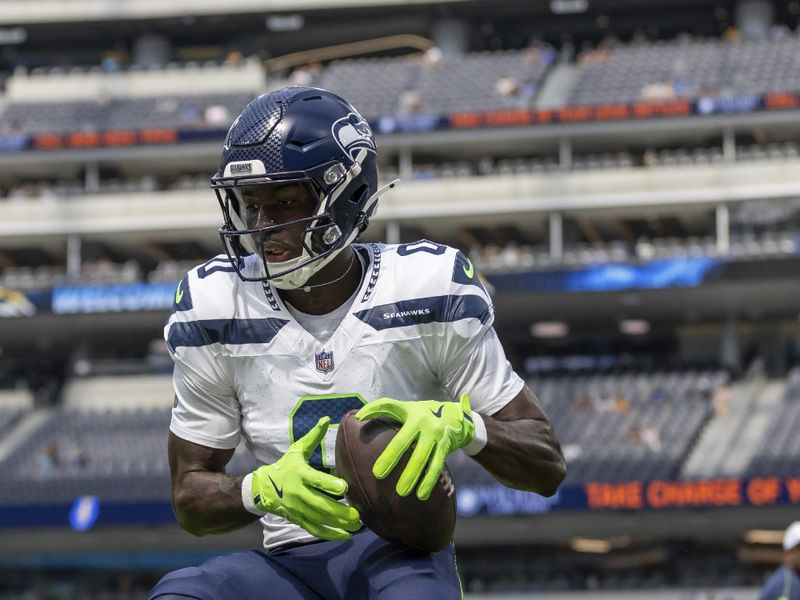 Seattle Seahawks wide receiver Ty Scott (0) warms up before playing against the Los Angeles Chargers in an NFL preseason football game, Saturday, Aug.10, 2024, in Inglewood, Calif. (AP Photo/Jeff Lewis)