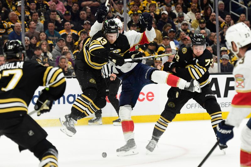 May 17, 2024; Boston, Massachusetts, USA; Boston Bruins center Danton Heinen (43) checks Florida Panthers center Sam Bennett (9) during the second period in game six of the second round of the 2024 Stanley Cup Playoffs at TD Garden. Mandatory Credit: Bob DeChiara-USA TODAY Sports