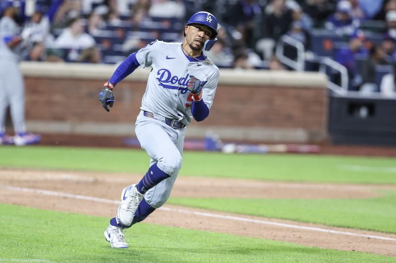 May 24, 2025; New York City, New York, USA;  Los Angeles Dodgers shortstop Mookie Betts (50) hits a single in the sixth inning against the New York Mets at Citi Field. Mandatory Credit: Wendell Cruz-Imagn Images