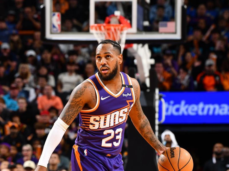 PHOENIX, AZ - NOVEMBER 30: Monte Morris #23 of the Phoenix Suns dribbles the ball during the game against the Golden State Warriors on November 30, 2024 at Footprint Center in Phoenix, Arizona. NOTE TO USER: User expressly acknowledges and agrees that, by downloading and or using this photograph, user is consenting to the terms and conditions of the Getty Images License Agreement. Mandatory Copyright Notice: Copyright 2024 NBAE (Photo by Barry Gossage/NBAE via Getty Images)