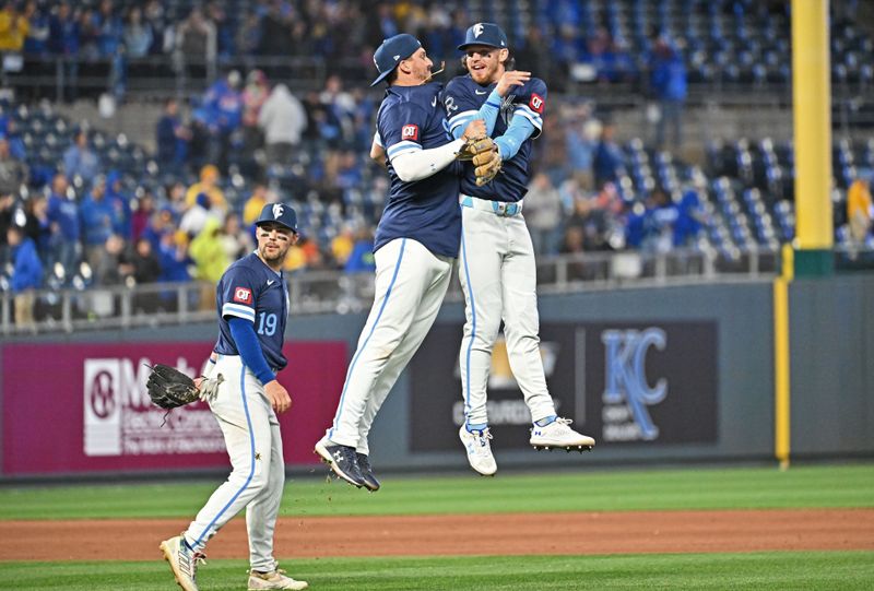 Apr 19, 2024; Kansas City, Missouri, USA; Kansas City Royals shortstop Bobby Witt Jr. (right) and first baseman Vinnie Pasquantino (left) celebrate after beating the Baltimore Orioles at Kauffman Stadium. Mandatory Credit: Peter Aiken-USA TODAY Sports