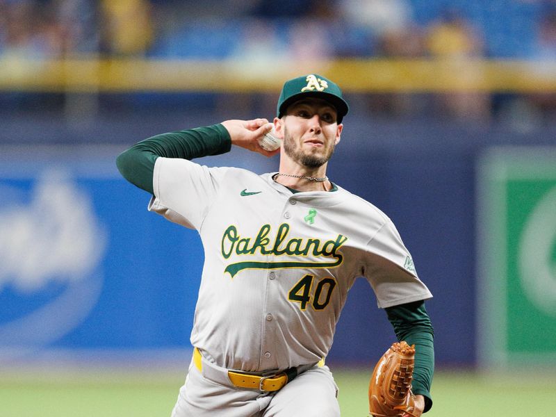 May 28, 2024; St. Petersburg, Florida, USA;  Oakland Athletics pitcher Mitch Spence (40) throws a pitch against the Tampa Bay Rays in the second inning at Tropicana Field. Mandatory Credit: Nathan Ray Seebeck-USA TODAY Sports