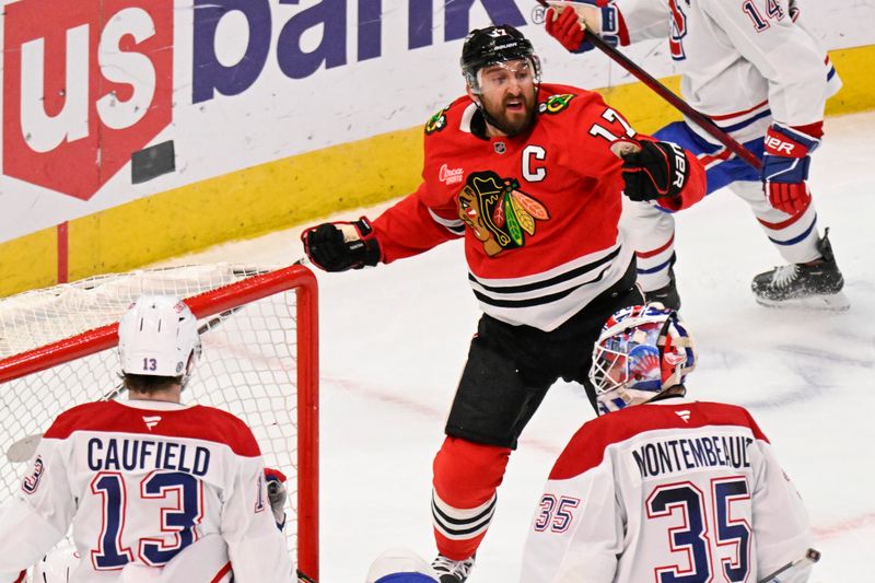 Jan 3, 2025; Chicago, Illinois, USA;  Chicago Blackhawks left wing Nick Foligno (17) celebrates after scoring a goal against the Montreal Canadiens during the third period at United Center. Mandatory Credit: Matt Marton-Imagn Images