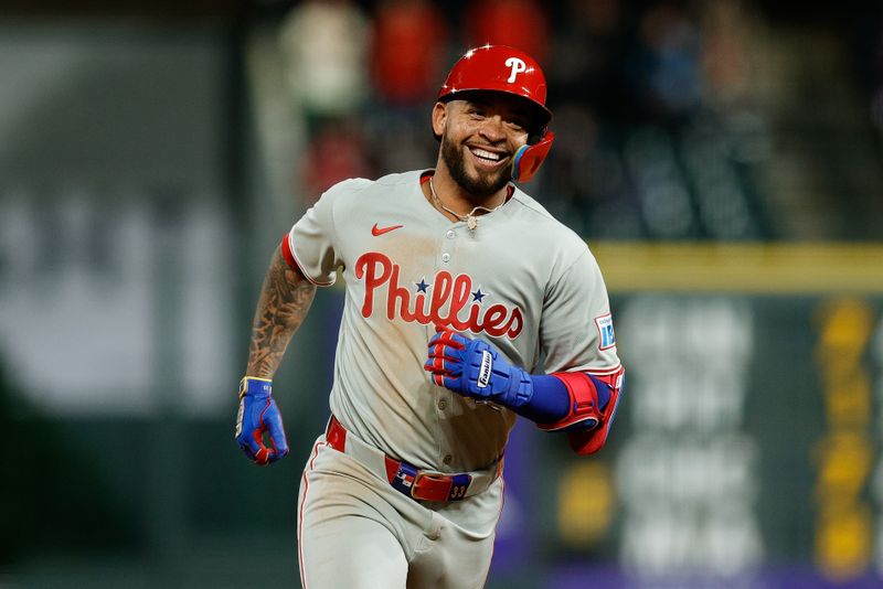 May 19, 2025; Denver, Colorado, USA; Philadelphia Phillies second baseman Edmundo Sosa (33) reacts as he rounds the bases on a two run home run in the ninth inning against the Colorado Rockies at Coors Field. Mandatory Credit: Isaiah J. Downing-Imagn Images
