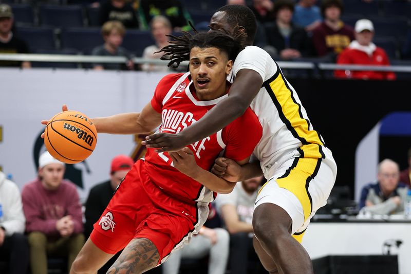 Mar 14, 2024; Minneapolis, MN, USA; Iowa Hawkeyes forward Ladji Dembele (13) fouls Ohio State Buckeyes forward Devin Royal (21) during the second half at Target Center. Mandatory Credit: Matt Krohn-USA TODAY Sports