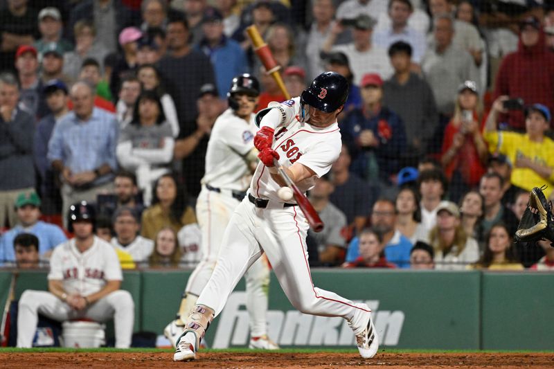 Sep 17, 2025; Boston, Massachusetts, USA; Boston Red Sox first baseman Nick Sogard (20) hits a walk-off RBI during the tenth inning against the Athletics at Fenway Park. Mandatory Credit: Eric Canha-Imagn Images