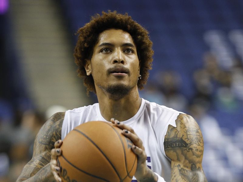 GREENSBORO, NORTH CAROLINA - OCTOBER 07: Kelly Oubre Jr. #12 of the Charlotte Hornets warms up prior to the game against the Boston Celtics at Greensboro Coliseum Complex on October 07, 2022 in Greensboro, North Carolina. NOTE TO USER: User expressly acknowledges and agrees that, by downloading and or using this photograph, User is consenting to the terms and conditions of the Getty Images License Agreement. (Photo by Jared C. Tilton/Getty Images)