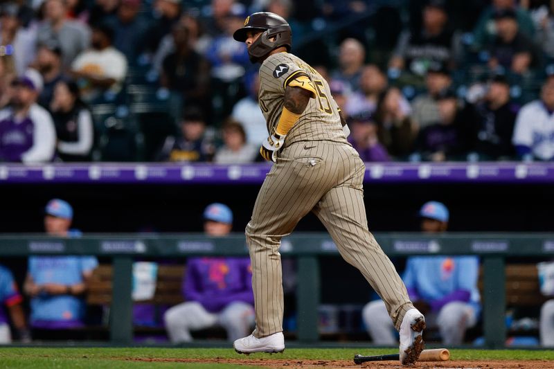 May 9, 2025; Denver, Colorado, USA; San Diego Padres catcher Martin Maldonado (15) watches his ball on a two run home run in the fifth inning against the Colorado Rockies at Coors Field. Mandatory Credit: Isaiah J. Downing-Imagn Images