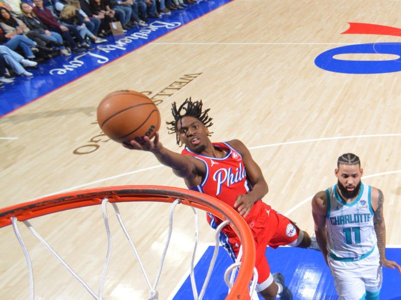 PHILADELPHIA, PA - MARCH 1: Tyrese Maxey #0 of the Philadelphia 76ers drives to the basket during the game against the Charlotte Hornets on March 1, 2024 at the Wells Fargo Center in Philadelphia, Pennsylvania NOTE TO USER: User expressly acknowledges and agrees that, by downloading and/or using this Photograph, user is consenting to the terms and conditions of the Getty Images License Agreement. Mandatory Copyright Notice: Copyright 2024 NBAE (Photo by Jesse D. Garrabrant/NBAE via Getty Images)