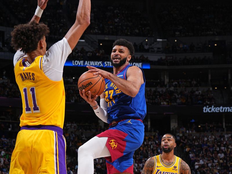 DENVER, CO - OCTOBER 24: Jamal Murray #27 of the Denver Nuggets drives to the basket during the game against the Los Angeles Lakers on October 24, 2023 at the Ball Arena in Denver, Colorado. NOTE TO USER: User expressly acknowledges and agrees that, by downloading and/or using this Photograph, user is consenting to the terms and conditions of the Getty Images License Agreement. Mandatory Copyright Notice: Copyright 2023 NBAE (Photo by Garrett Ellwood/NBAE via Getty Images)