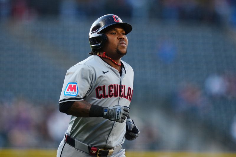 May 28, 2024; Denver, Colorado, USA; Cleveland Guardians third base José Ramírez (11) runs off his two run home run in the first inning against the Colorado Rockies at Coors Field. Mandatory Credit: Ron Chenoy-USA TODAY Sports