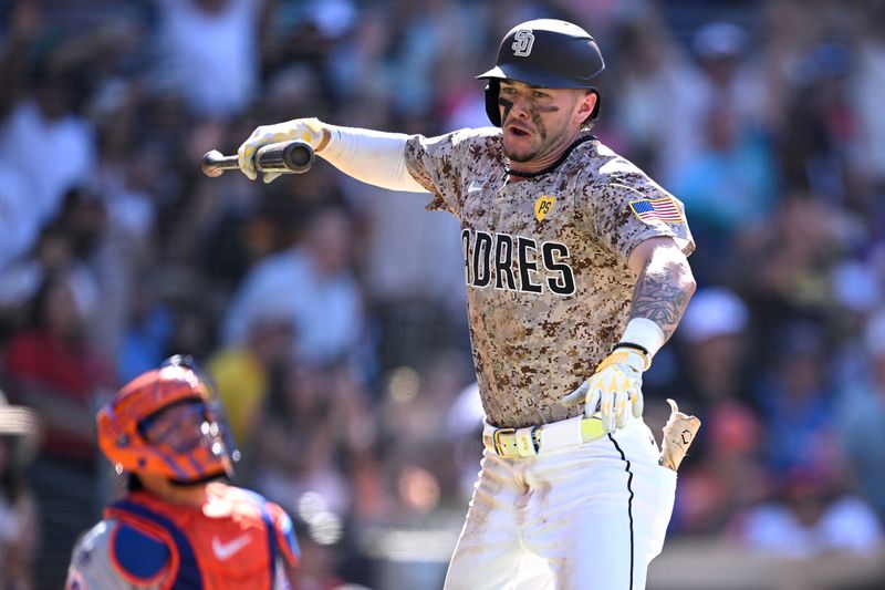 Aug 25, 2024; San Diego, California, USA; San Diego Padres center fielder Jackson Merrill (3) celebrates on the field after hitting a walk-off home run against the New York Mets the at Petco Park. Mandatory Credit: Orlando Ramirez-USA TODAY Sports