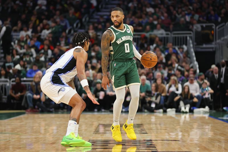 MILWAUKEE, WISCONSIN - DECEMBER 21: Damian Lillard #0 of the Milwaukee Bucks is defended by Gary Harris #14 of the Orlando Magic during a game at Fiserv Forum on December 21, 2023 in Milwaukee, Wisconsin. NOTE TO USER: User expressly acknowledges and agrees that, by downloading and or using this photograph, User is consenting to the terms and conditions of the Getty Images License Agreement. (Photo by Stacy Revere/Getty Images)