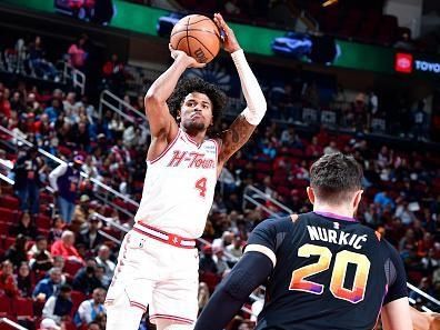 HOUSTON, TX - DECEMBER 27:   Jalen Green #4 of the Houston Rockets shoots the ball during the game against the Phoenix Suns on December 27, 2023 at the Toyota Center in Houston, Texas. NOTE TO USER: User expressly acknowledges and agrees that, by downloading and or using this photograph, User is consenting to the terms and conditions of the Getty Images License Agreement. Mandatory Copyright Notice: Copyright 2023 NBAE (Photo by Logan Riely/NBAE via Getty Images)