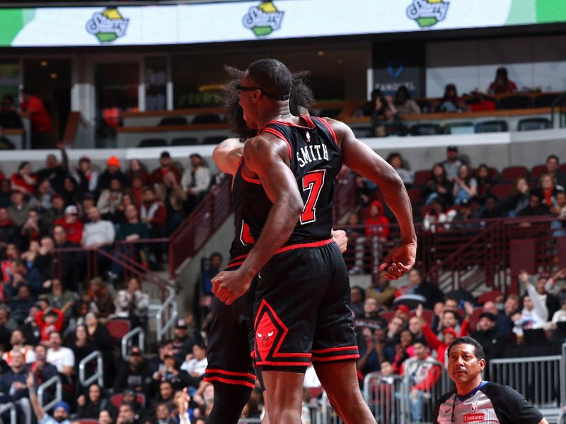 CHICAGO, IL - NOVEMBER 22: Jalen Smith #7 and Coby White #0 of the Chicago Bulls celebrate during the game against the Atlanta Hawks during the Emirates NBA Cup game on November 22, 2024 at United Center in Chicago, Illinois. NOTE TO USER: User expressly acknowledges and agrees that, by downloading and or using this photograph, User is consenting to the terms and conditions of the Getty Images License Agreement. Mandatory Copyright Notice: Copyright 2024 NBAE (Photo by Jeff Haynes/NBAE via Getty Images)