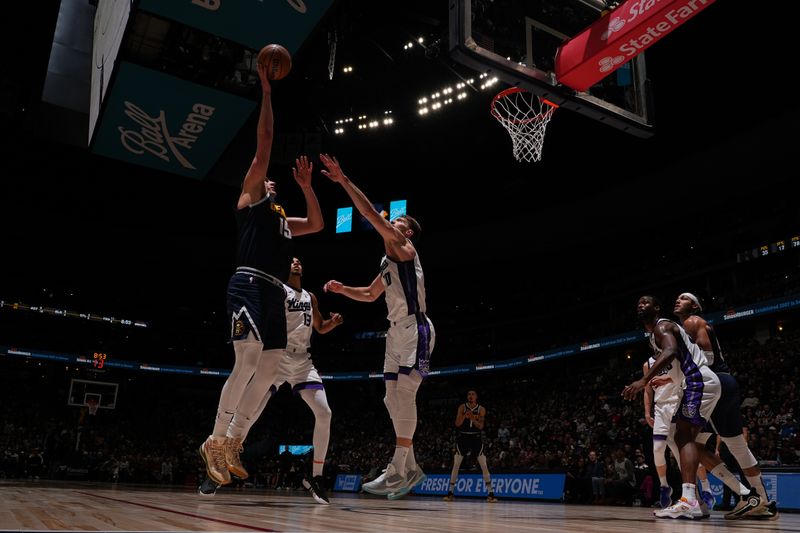 DENVER, CO - FEBRUARY 14: Nikola Jokic #15 of the Denver Nuggets drives to the basket during the game against the Sacramento Kings on February 14, 2024 at the Ball Arena in Denver, Colorado. NOTE TO USER: User expressly acknowledges and agrees that, by downloading and/or using this Photograph, user is consenting to the terms and conditions of the Getty Images License Agreement. Mandatory Copyright Notice: Copyright 2024 NBAE (Photo by Bart Young/NBAE via Getty Images)