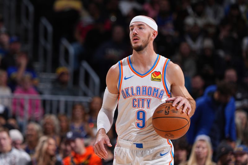 DENVER, CO - NOVEMBER 6: Alex Caruso #9 of the Oklahoma City Thunder dribbles the ball during the game against the Denver Nuggets on November 6, 2024 at Ball Arena in Denver, Colorado. NOTE TO USER: User expressly acknowledges and agrees that, by downloading and/or using this Photograph, user is consenting to the terms and conditions of the Getty Images License Agreement. Mandatory Copyright Notice: Copyright 2024 NBAE (Photo by Garrett Ellwood/NBAE via Getty Images)