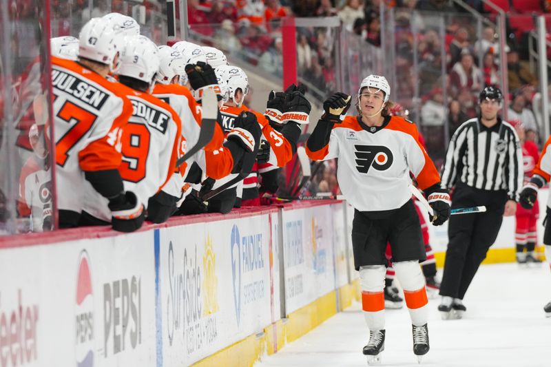 Dec 14, 2025; Raleigh, North Carolina, USA; Philadelphia Flyers center Trevor Zegras (46) celebrates his goal against the Carolina Hurricanes during the third period at Lenovo Center. Mandatory Credit: James Guillory-Imagn Images