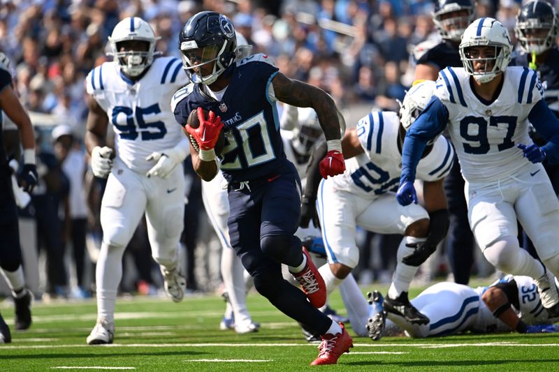 Tennessee Titans running back Tony Pollard (20) runs for a touchdown during the second half of an NFL football game against the Indianapolis Colts, Sunday, Oct. 13, 2024, in Nashville, Tenn. (AP Photo/John Amis)