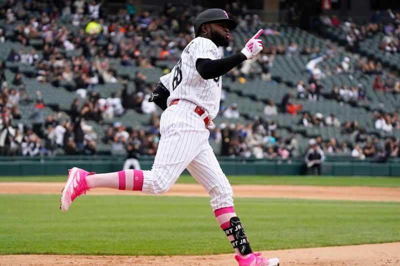 May 14, 2023; Chicago, Illinois, USA; Chicago White Sox center fielder Luis Robert Jr. (88) runs the bases after hitting a home run against the Houston Astros during the fourth inning at Guaranteed Rate Field. Mandatory Credit: David Banks-USA TODAY Sports