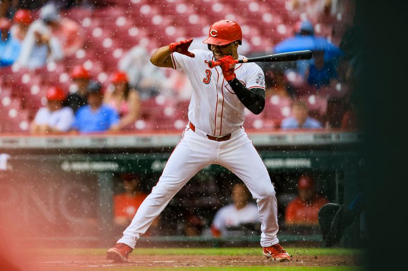 Aug 18, 2024; Cincinnati, Ohio, USA; Cincinnati Reds designated hitter Jeimer Candelario (3) reacts after getting hit by a wild pitch in the second inning against the Kansas City Royals at Great American Ball Park. Mandatory Credit: Katie Stratman-USA TODAY Sports