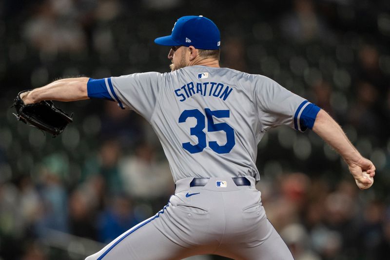 May 13, 2024; Seattle, Washington, USA; Kansas City Royals reliever Chris Stratton (35) delivers a pitch during the eighth inning against the Seattle Mariners at T-Mobile Park. Mandatory Credit: Stephen Brashear-USA TODAY Sports