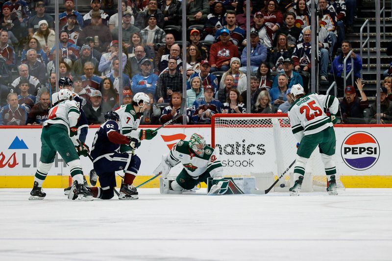 Apr 9, 2024; Denver, Colorado, USA; Colorado Avalanche left wing Artturi Lehkonen (62) scores a goal past Minnesota Wild goaltender Filip Gustavsson (32) as center Joel Eriksson Ek (14) and defenseman Brock Faber (7) and defenseman Jonas Brodin (25) look on in the first period at Ball Arena. Mandatory Credit: Isaiah J. Downing-USA TODAY Sports