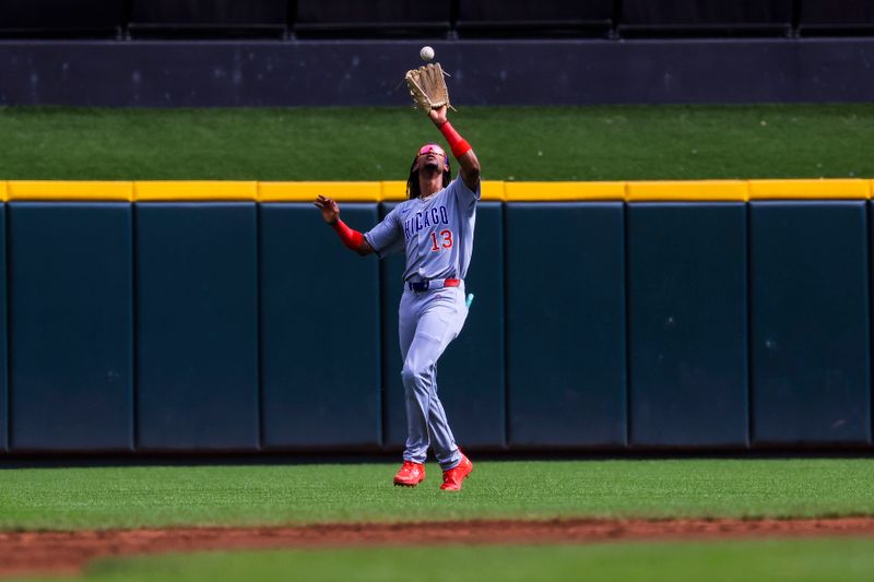 Sep 21, 2025; Cincinnati, Ohio, USA; Chicago Cubs outfielder Kevin Alcantara (13) catches a fly out hit by Cincinnati Reds outfielder TJ Friedl (not pictured) in the third inning at Great American Ball Park. Mandatory Credit: Katie Stratman-Imagn Images