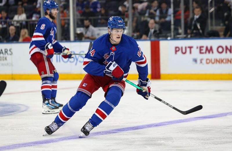 Sep 24, 2024; New York, New York, USA; New York Rangers center Adam Edstrom (84) skates against the New York Islanders during the third period at Madison Square Garden. Mandatory Credit: Danny Wild-Imagn Images